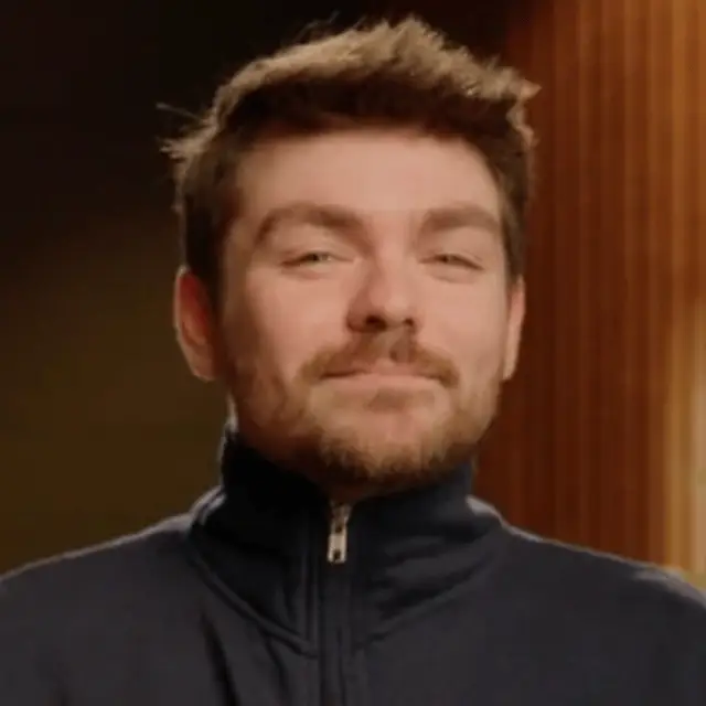 Controversial commentator faces outrage for selling Jeffrey Epstein-themed merchandise to online followers.